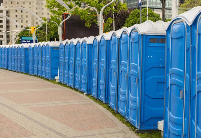 a row of sleek and modern portable restrooms at a special outdoor event in Gardner, KS